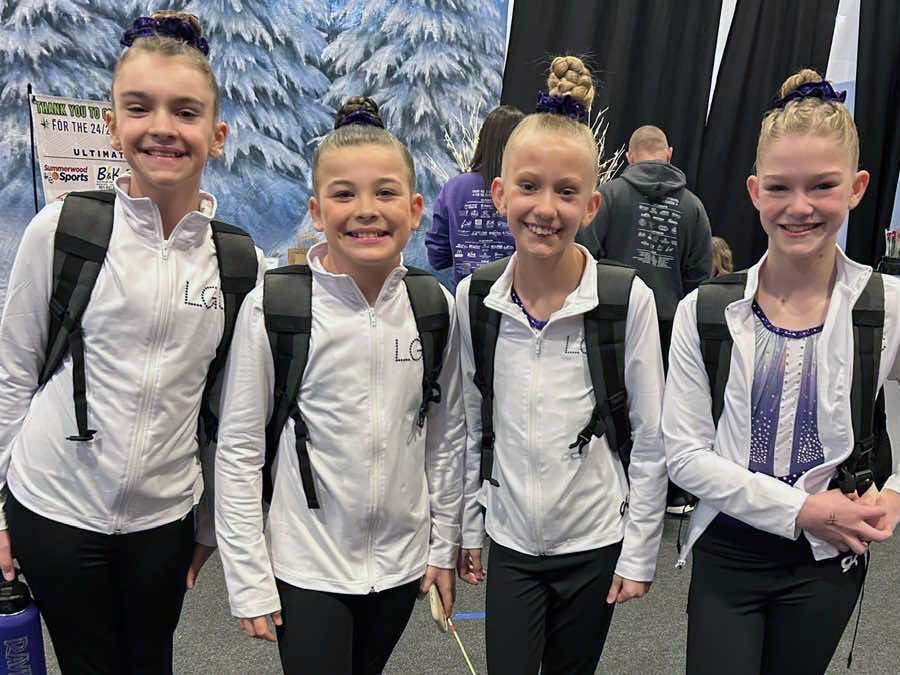 Snow Globe Classic team celebrating with medals